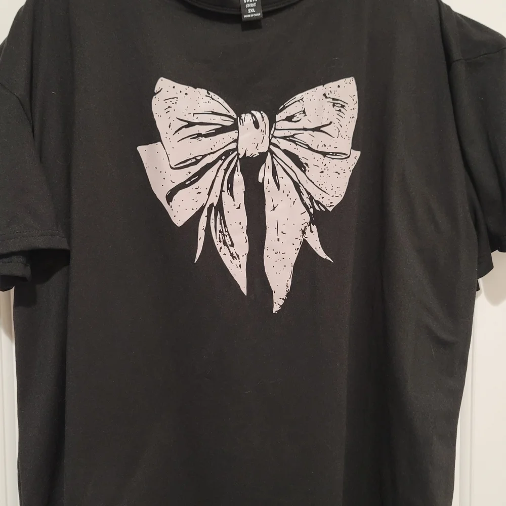 SHEIN Black Tee with Cream Bow Design - Picture 1 of 2